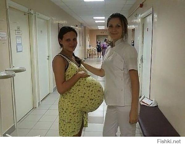 вот это фейк полнейший. Даже элементарно, с таким животом она бы так ровненько не стояла, там тяжесть неимоверная
