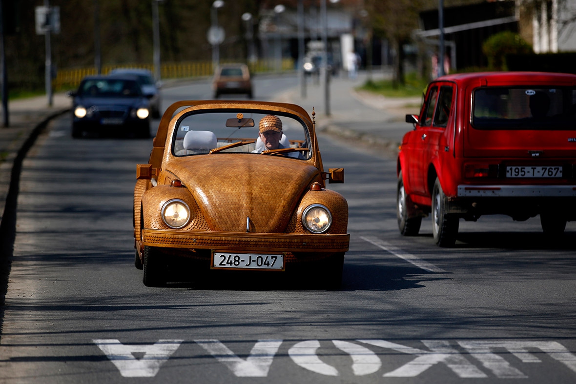 See That Guy In The Volkswagen Beetle? Well, Wait Til You Look Closer 
