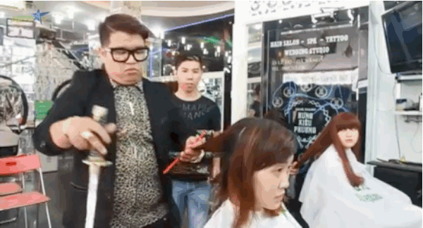 Vietnamese Hairdresser Uses A Samurai Sword To Chop Trendy Hairdos Vietnamese Hairdresser Uses A Samurai Sword To Chop Trendy Hairdos