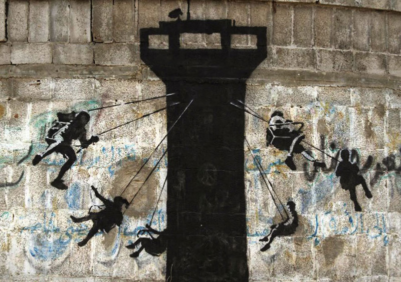 Banksy Sneaks Into Gaza To Create Controversial Street Art