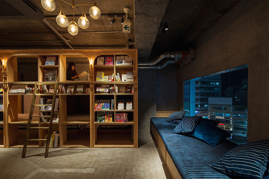 Bookstore-Themed Tokyo Hotel Has 1,700 Books And Sleeping Shelves Next To Them