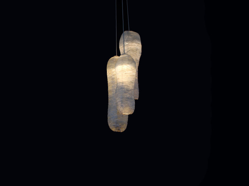 Three lamps made out of bacon. Their shape inspired by E. Coli, a bacteria that lives in meat and causes meat spoilage after a certain period.