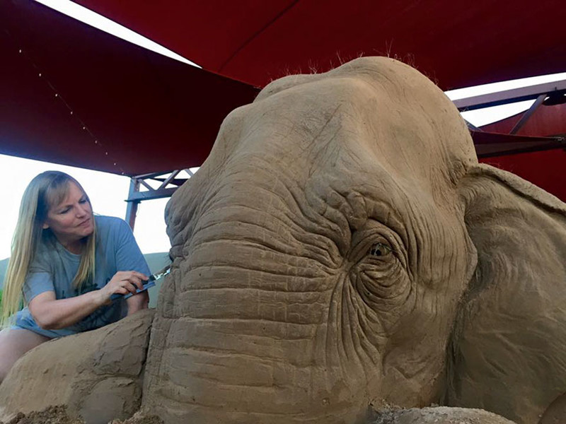 Stunning Sand Sculpture Of A Life-Size Elephant Playing Chess With A Mouse