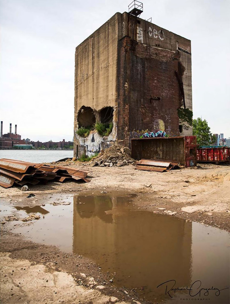 Street Artist Greg Suits Turns An Abandoned Building Into A Giant Skull