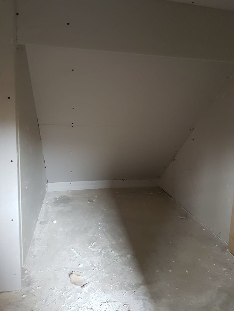 Plasterboard fitted, starting to look like a room