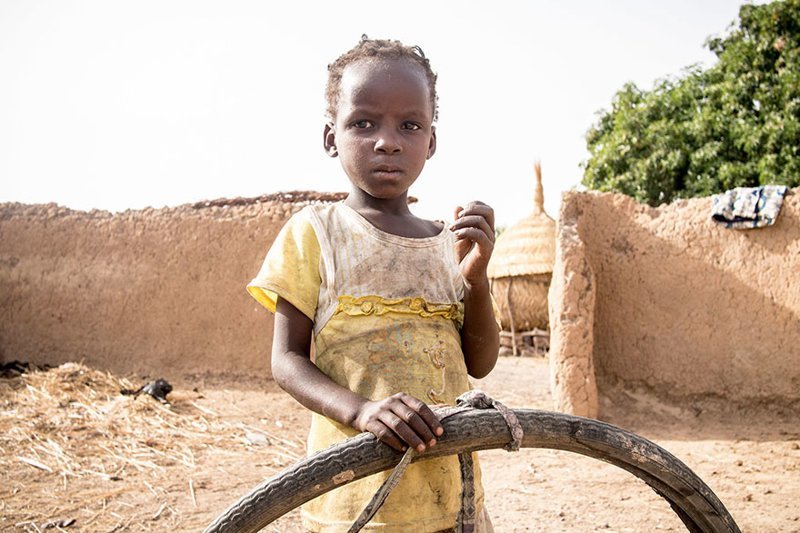 In a Burkinabe home living on $29/month per adult, the favorite toy is an old tire