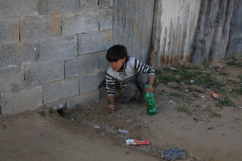 In a Palestinian home living on $112/month per adult, the favorite toy is a plastic bottle