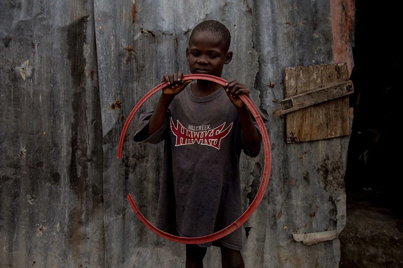 In a Haitian home living on $43/month per adult, the favorite toy is a hoop