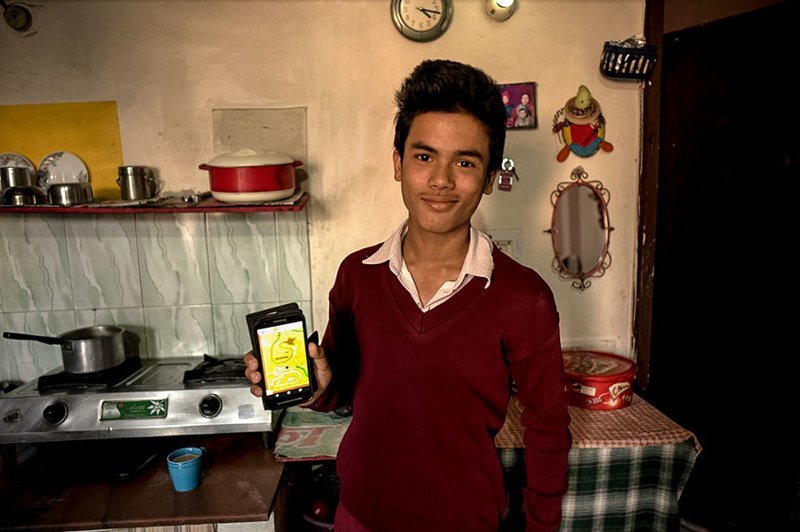 In a Indian home living on $369/month per adult, the favorite toy is a cell phone