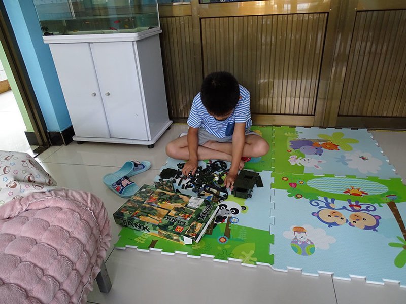 In a Chinese home living on $2,235/month per adult, the favorite toy is a military tank model