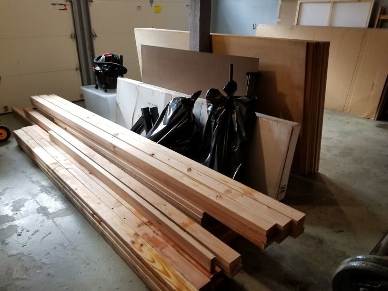 I bought 2×4 lumber at a local lumberyard in 8, 10, and 14 foot sizes. I also purchased the plywood I needed for the desks and upper cabinets (the latter which I still have to build)