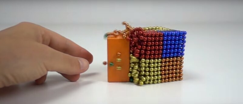 Mesmerizing Footage of the Powerful Attraction Between Super Strong Magnets and Magnetic Balls